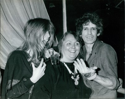 Patti Hansen, Kay Witchell and Keith Richards having fun at a party