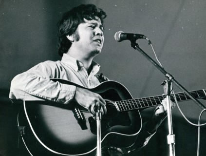 Folk singer Pat Sky on stage