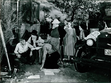 Henry Fonda and other cast members in scene from The Grapes of Wrath