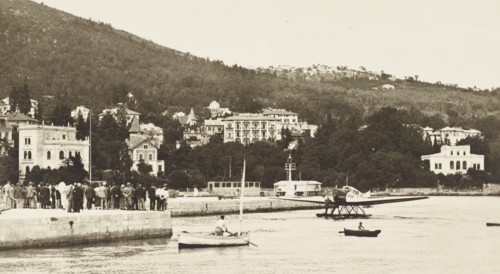 Jugoslavia, Croatia, Abbazia Harbour, today's Opatija,   a seaplane has landed near the dock, with several people watching from the shore, 1920 circa