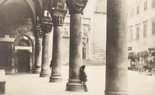 Croatia, Dubrovnik, Ragusa, young boy in the outer porch of the Rector's Palace Knezev dvor, 1920 circa