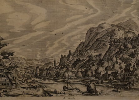 River landscape with a barge in the foreground