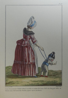 Governess and a child in a white suit