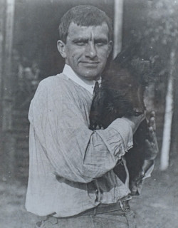 Portrait of Mayakovsky Vladimir Vladimirovich (1893-1930) with dog Scottic