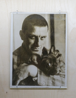 Portrait of Mayakovsky Vladimir Vladimirovich (1893-1930) with dog Bulka