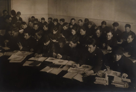 Yakov Chernikhov (1889-1951) teaches a class on descriptive geometry at the workers' faculty
