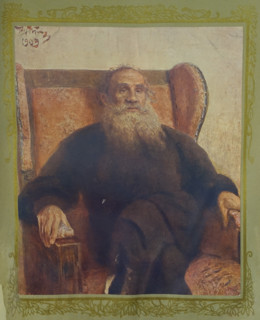 Portrait of Leo Tolstoy (1828-1910) in a red armchair