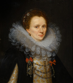 Young Woman in a Dress with a Ruffled Lace Collar