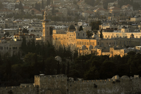 Jerusalem, Israel. Walls and the Old City at sunset.