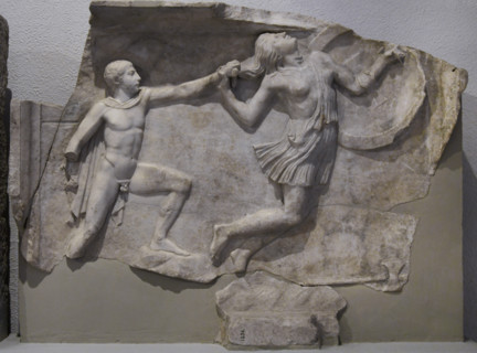 Relief depicting a Greek pursuing an Amazon. Marble. It is part of a pair of duplicate relief