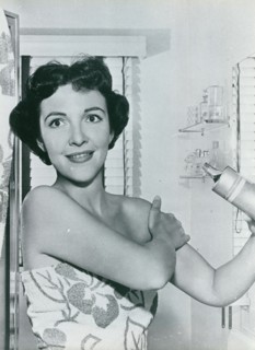 Nancy Davis (later Reagan) in advertisement for shower products
