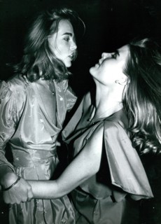 Margaux Hemingway and sister Mariel Hemingway dancing