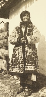Elderly woman in traditional Romanian dress costume