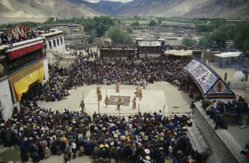 CHINA, Tibet, Samye Monastery, Crowds and dancers at Tibetan Full Moon Festival.