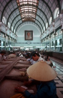 VIETNAM, Ho Chi Minh City, Post Office interior depicting glass canopy and iron framed roof.