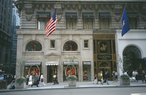 USA, New York , New York, Manhattan’s 5th Avenue Christian Dior shopfront with pedestrians walking