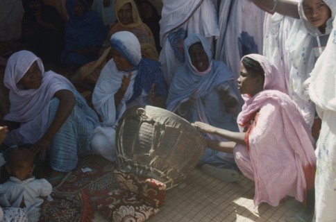 MAURITANIA, Atar, Women sitting around Womans Day drum