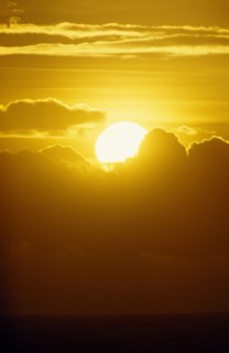 WEATHER, Climate, Sunset, "Golden sunset breaking through clouds over the sea at Hastings, East