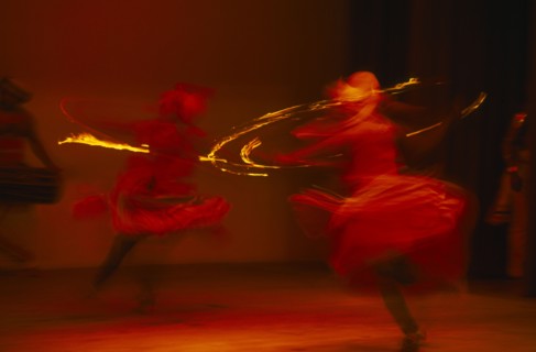 SRI LANKA, Kandy, Kandy dancers in movement blur