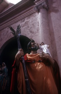 CUBA, Religion, View looking up at statue of Christ with angelic child on his sholder