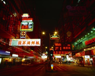 HONG KONG, Kowloon Peninsula, Kowloon, "Nathan Road at night with colourful neon lights, traffic