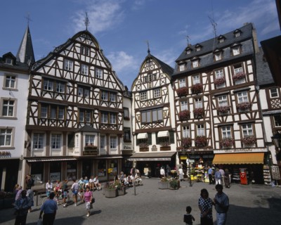 GERMANY, Rhineland, Bernkastel, Town square in the Mosel town. Traditional buildings with people