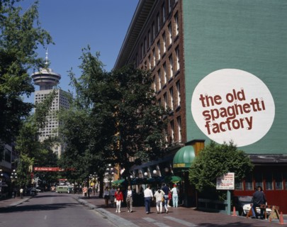CANADA, British Columbia, Vancouver, Gastown. The Old Spaghetti Factory restaurant with people on