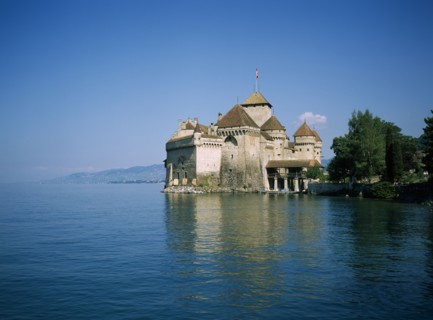 SWITZERLAND, Vaud, Chateau de Chillon, View over Lake Geneva towards the 13th century castle.