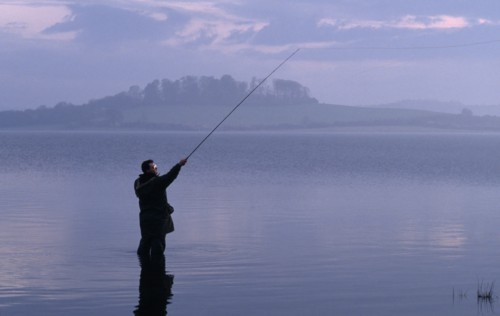 10035843 SPORT  Fishing Line fisherman on Rutland Water.