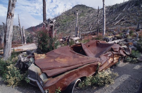 USA, Washington, Skamania, Mount St Helens National Volcanic Monument. Crushed car and flattened