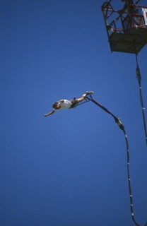 SPORT,  , Bungee Jumping, Man diving from a crane with elastic cord tied to his ankles