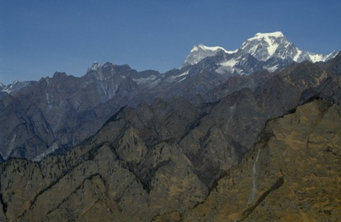 INDIA, Uttar Pradesh, Himalayas, Mountain landscape showing folds in the Himalayas and peaks and