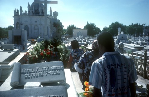 CUBA, Havana, People walking through graveyard on Fathers Day