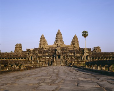 CAMBODIA, Angkor, Angkor Wat.  Causeway leading to main temple and triple pagodas.