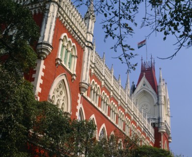 INDIA, West Bengal , Calcutta, Town Hall.  Angled view of red and white exterior.