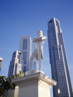 SINGAPORE, Architecture, Statue of Sir Stamford Raffles with high rise buildings in Raffles Place