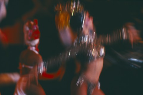 CUBA, Havana Province, Havana, Club Tropicana dancers in blurred movement through long camera