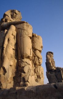 EGYPT, Thebes, The Colossi of Memnon the only remains of the Mortuary Temple of  Amenophis III