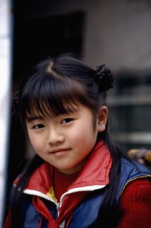 CHINA, Leshan, Portrait of a young girl