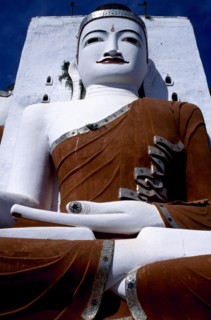 MYANMAR, Yangon, Kyaikpun, Angled view looking up at seated Buddha statue dating from 1746