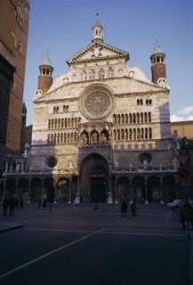 ITALY, Emilia Romagna , Cremona, "Il Duomo exterior facade with people, children and pigeons in