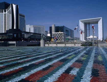FRANCE, Il de France, Paris ,  La Defence.  La Grande Arche seen from across colourful abstract