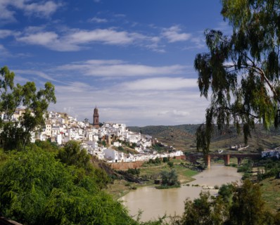 SPAIN, Andalucia, Cordoba Province, "Montoro, view over white painted hillside village with river