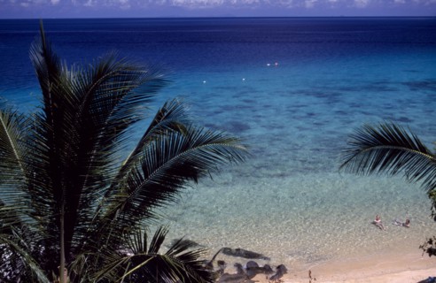 MALAYSIA, East Coast, Pulau Tioman, View looking down on sandy beach on the west coast of the