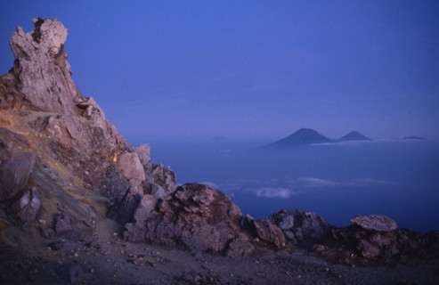INDONESIA, Java, Mount Merapi, View from the rocky summit of the volcano with peaks in the distance