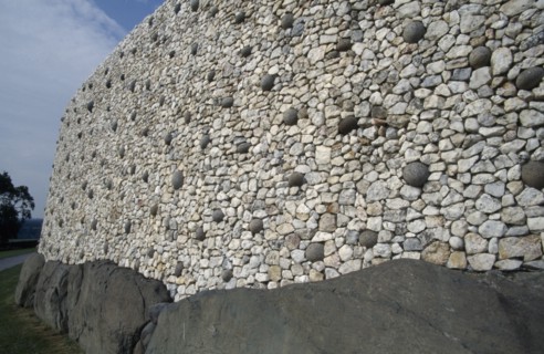 IRELAND, County Meath, Boyne Valley , Newgrange World Heritage Site. Wall detail of Prehistoric