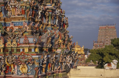 INDIA, Tamil Nadu , Madurai , Sri Meenakshi Temple exterior.  Detail of colourful carved gopuram.