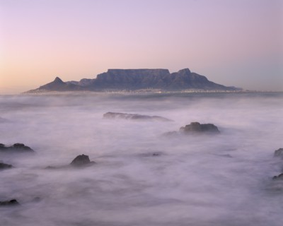 SOUTH AFRICA, Cape Province, Cape Town, View of Table Mountain at dawn taken from Bloubergstrand