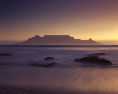 SOUTH AFRICA, Cape Province, Cape Town, View of Table Mountain at dawn taken from Bloubergstrand