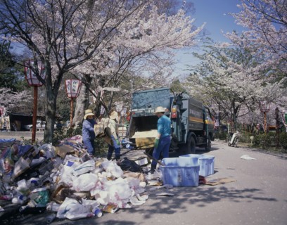 JAPAN, Honshu, Kyoto, Maruyama Park rubbish collection during Cherry Blossom season